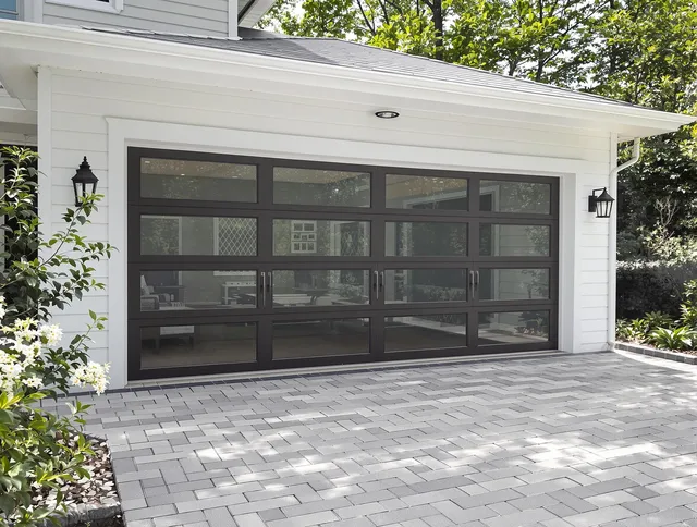 Twinsburg Garage Door Repair design specialist presenting custom garage door options to Twinsburg homeowner
