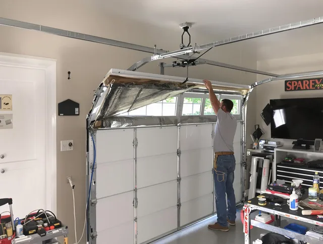 Garage door section replacement by Twinsburg Garage Door Repair in Twinsburg