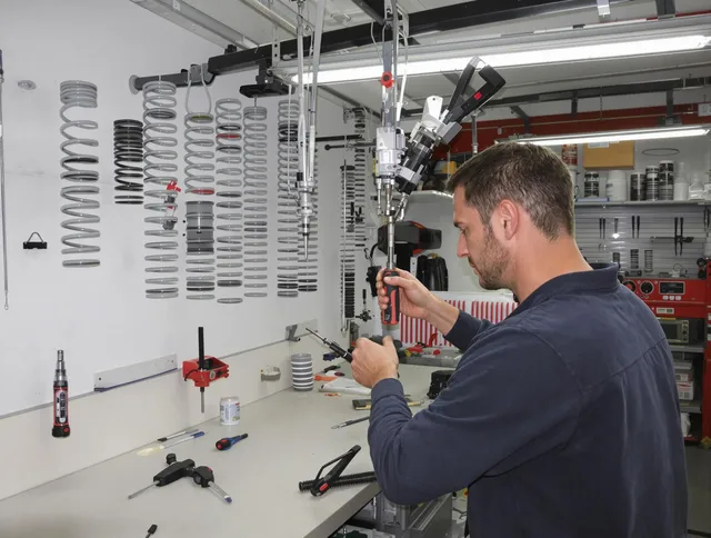 Twinsburg Garage Door Repair safety certified technician performing precision spring replacement in Twinsburg