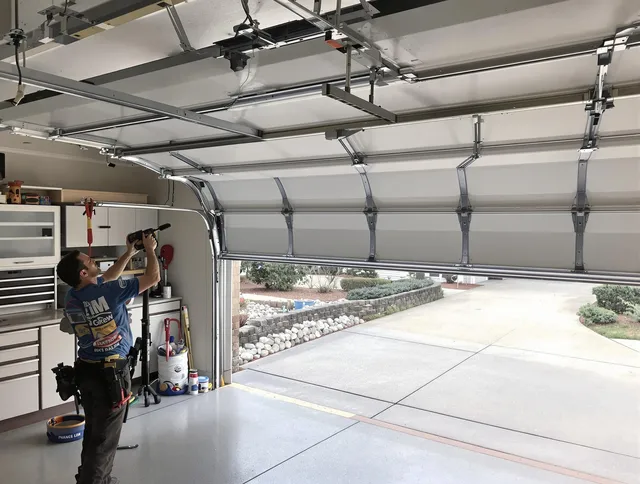 Garage door track repair service by Twinsburg Garage Door Repair in Twinsburg